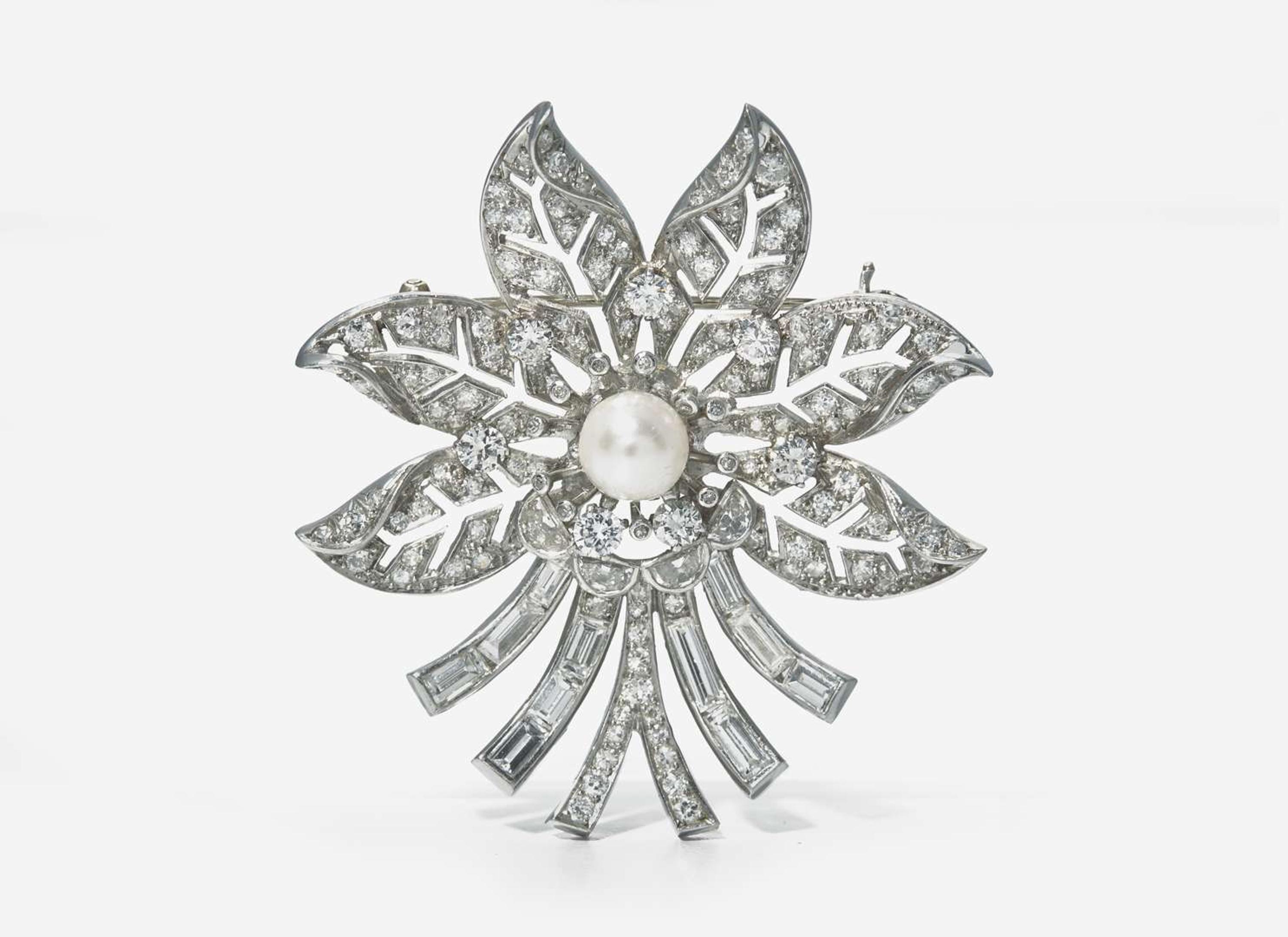 A Platinum and Diamond Flower Brooch