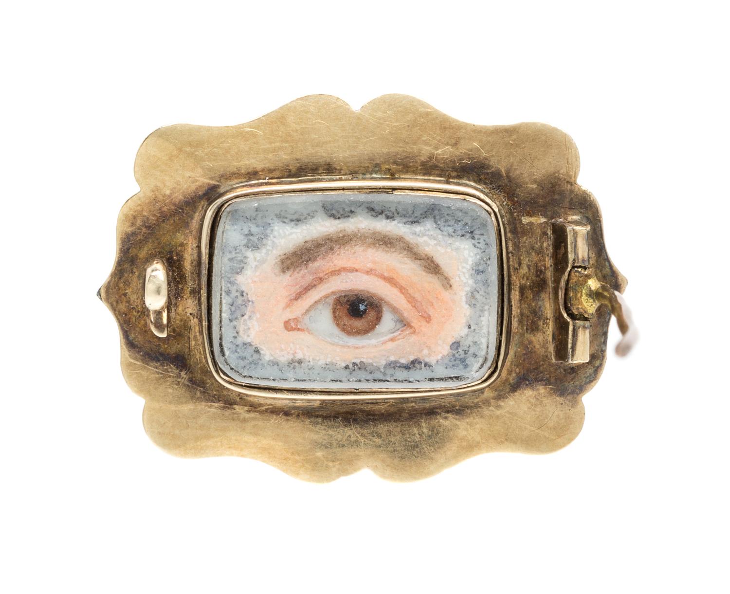 An Antique Yellow Gold, Onyx, Seed Pearl and Diamond Lover's Eye Brooch, 3.20 dwts.