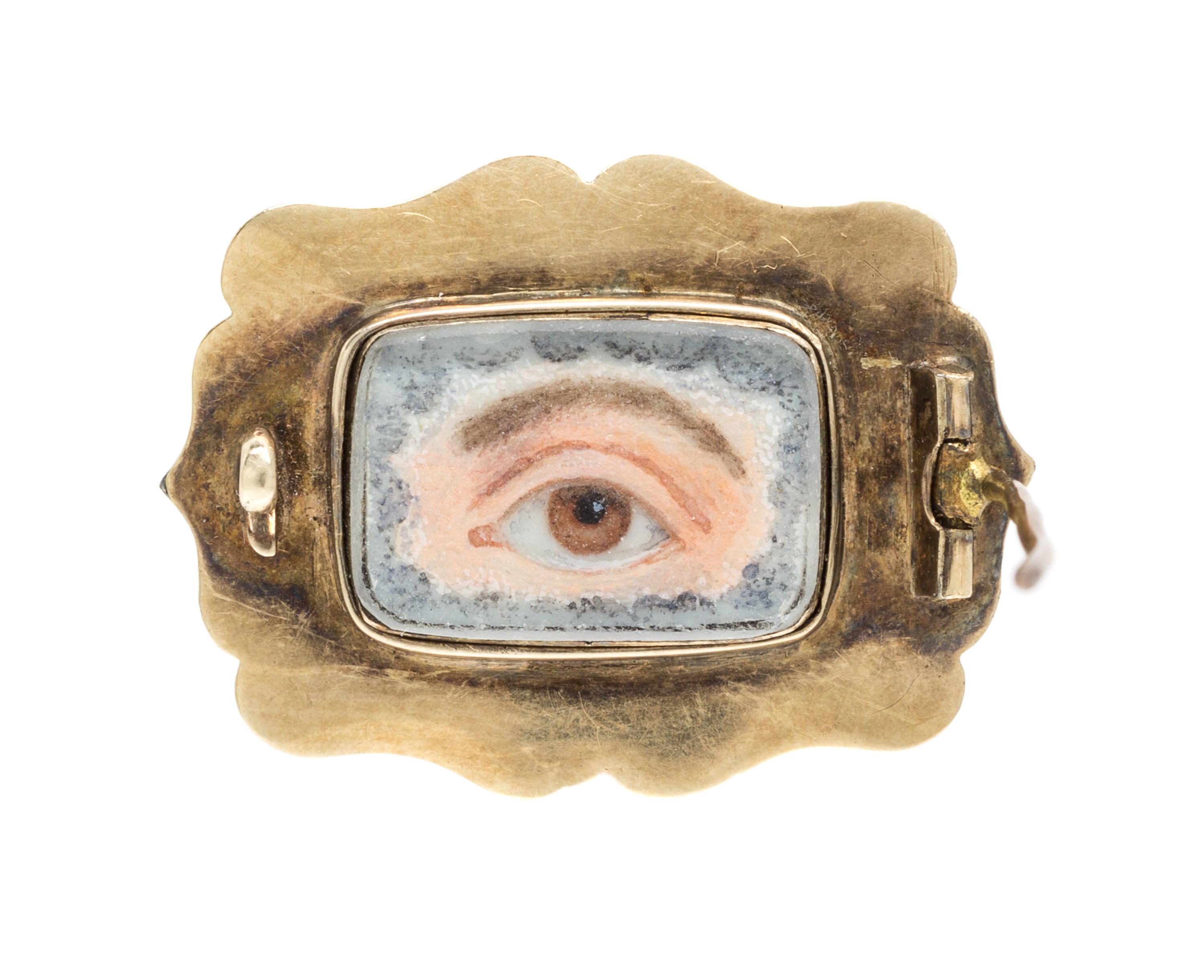 An Antique Yellow Gold, Onyx, Seed Pearl and Diamond Lover's Eye Brooch, 3.20 dwts.