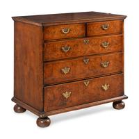 A George II Walnut Chest of Drawers