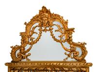 A Pair of Régence Style Giltwood Mirrors