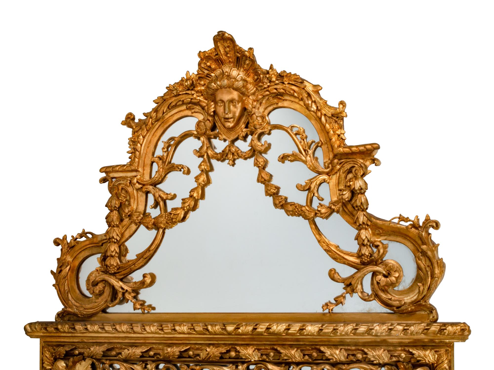 A Pair of Régence Style Giltwood Mirrors