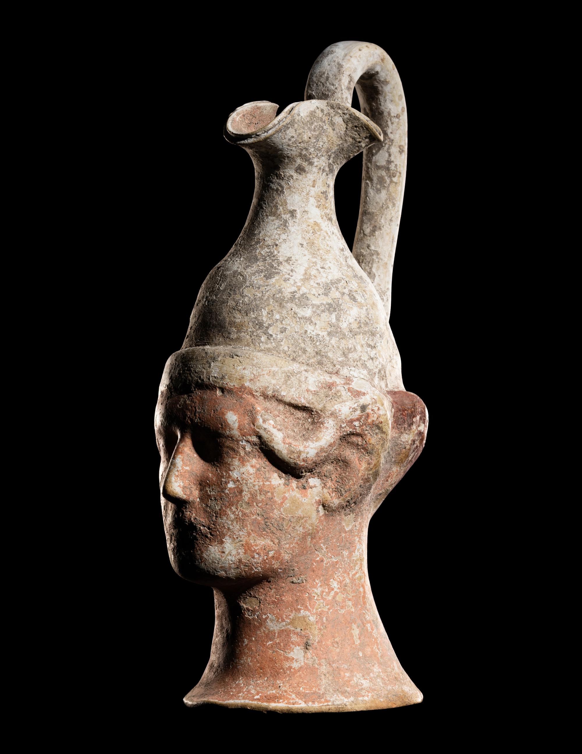 A Canosan Trefoil Oinochoe in the Form of a Head of a Man