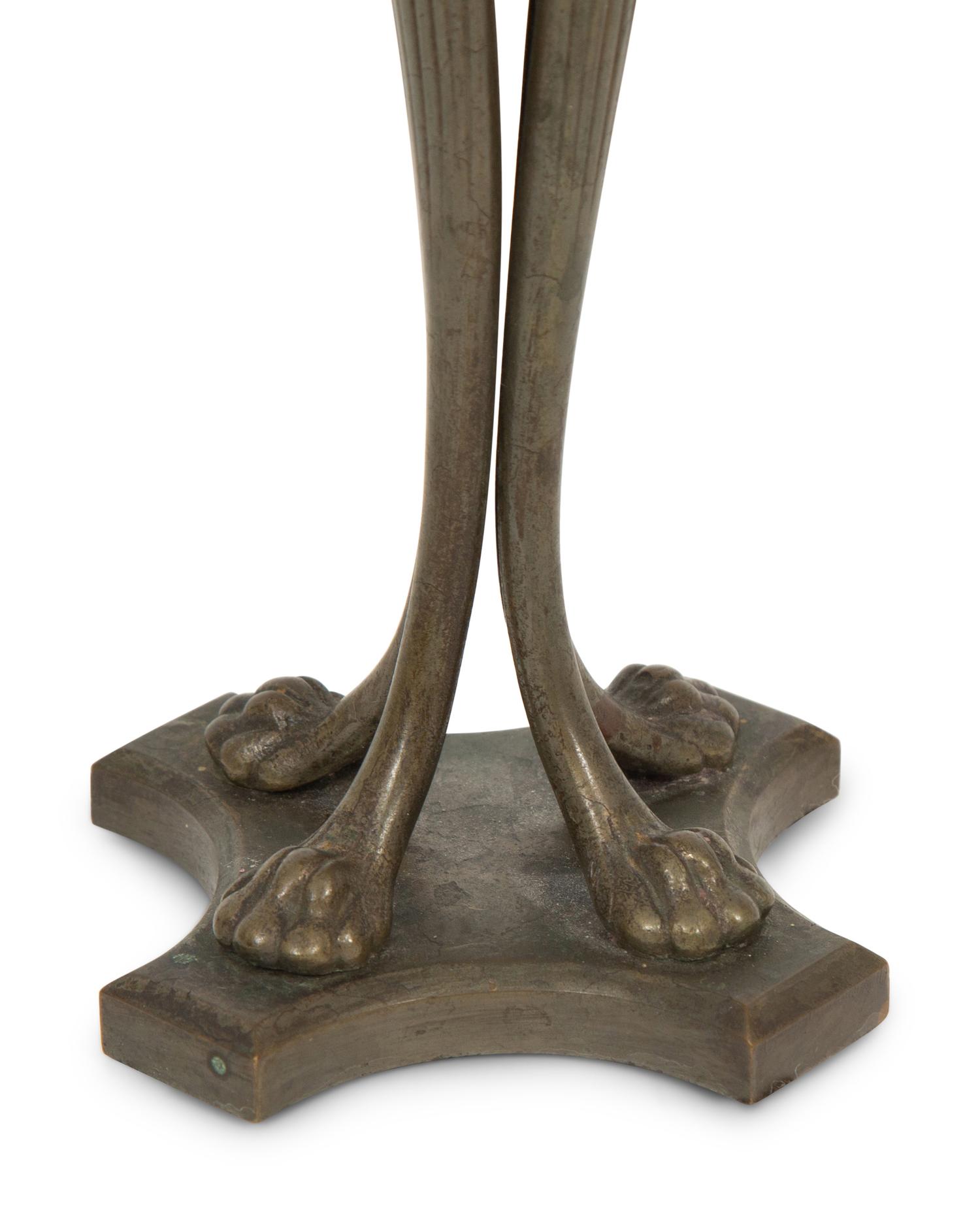 A Tiffany Studios Cat's Paw Bronze Candlestick
