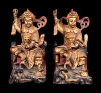 A Pair of Small Chinese Gilt and Red Lacquered Wood Figures of Guardians