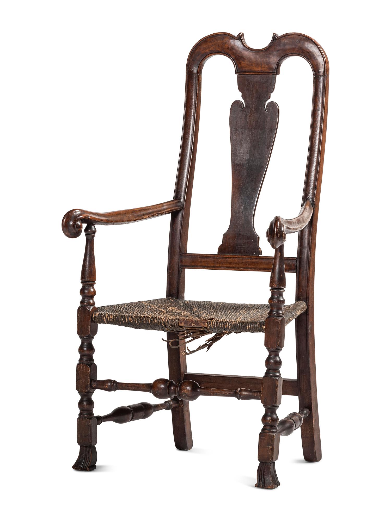 A Queen Anne Mixed Woods Rush-Seat Spanish-Foot Armchair