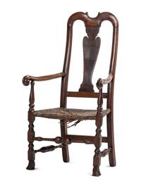 A Queen Anne Mixed Woods Rush-Seat Spanish-Foot Armchair