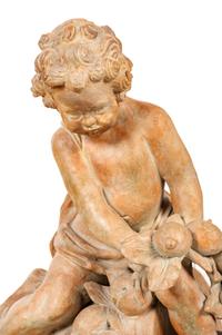A Pair of Terra Cotta Putti Ornaments