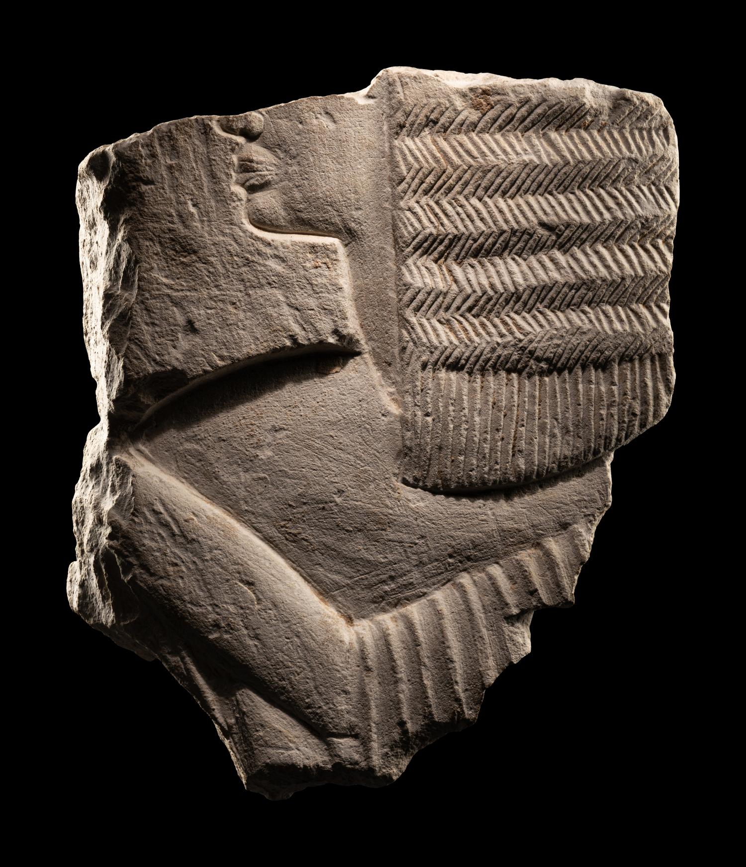 An Egyptian Limestone Relief Fragment