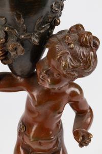 A Pair of French Patinated Bronze Figures of Infant Water Carriers — CIRCA 1900