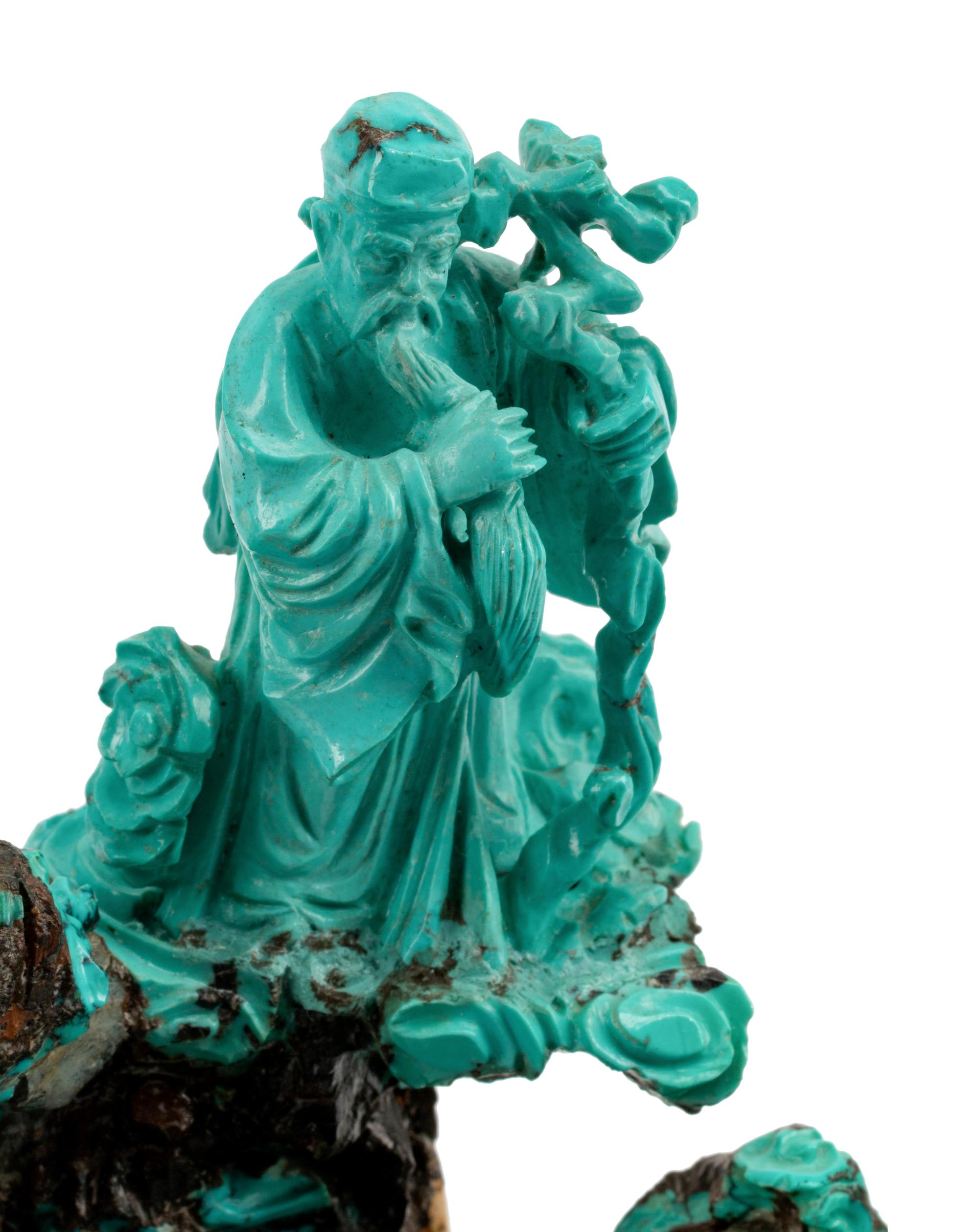 A Chinese Export Carved Turquoise Figural Group