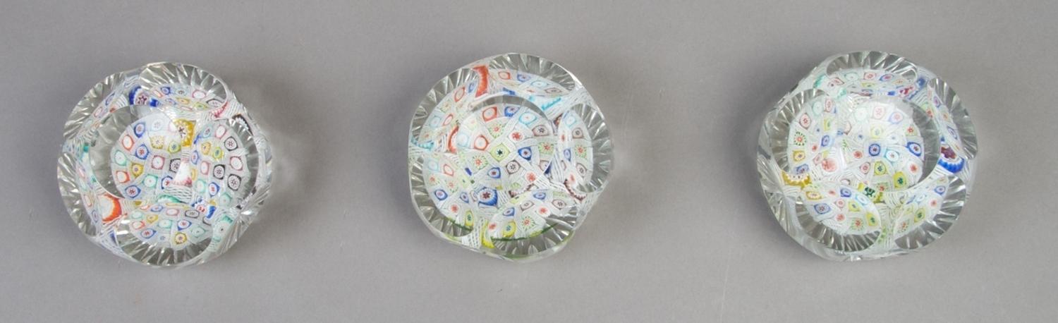 A Collection of Three Faceted Millefiori Paperweights, Diameter 3 inches.