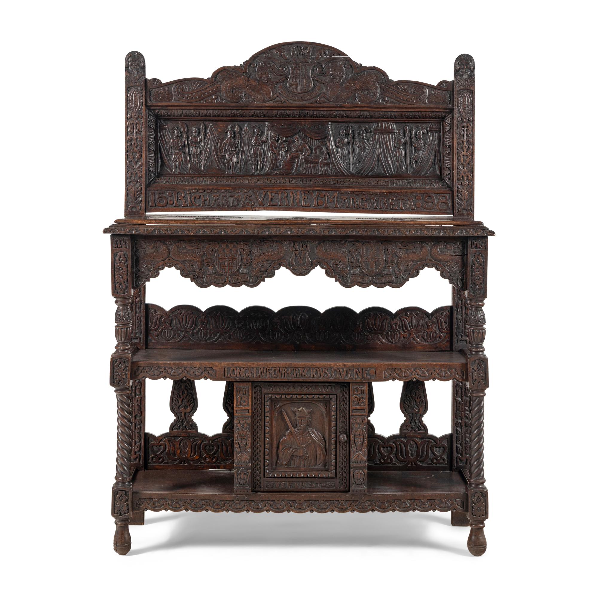 An Elizabethan Style Carved Oak Three-Tier Server