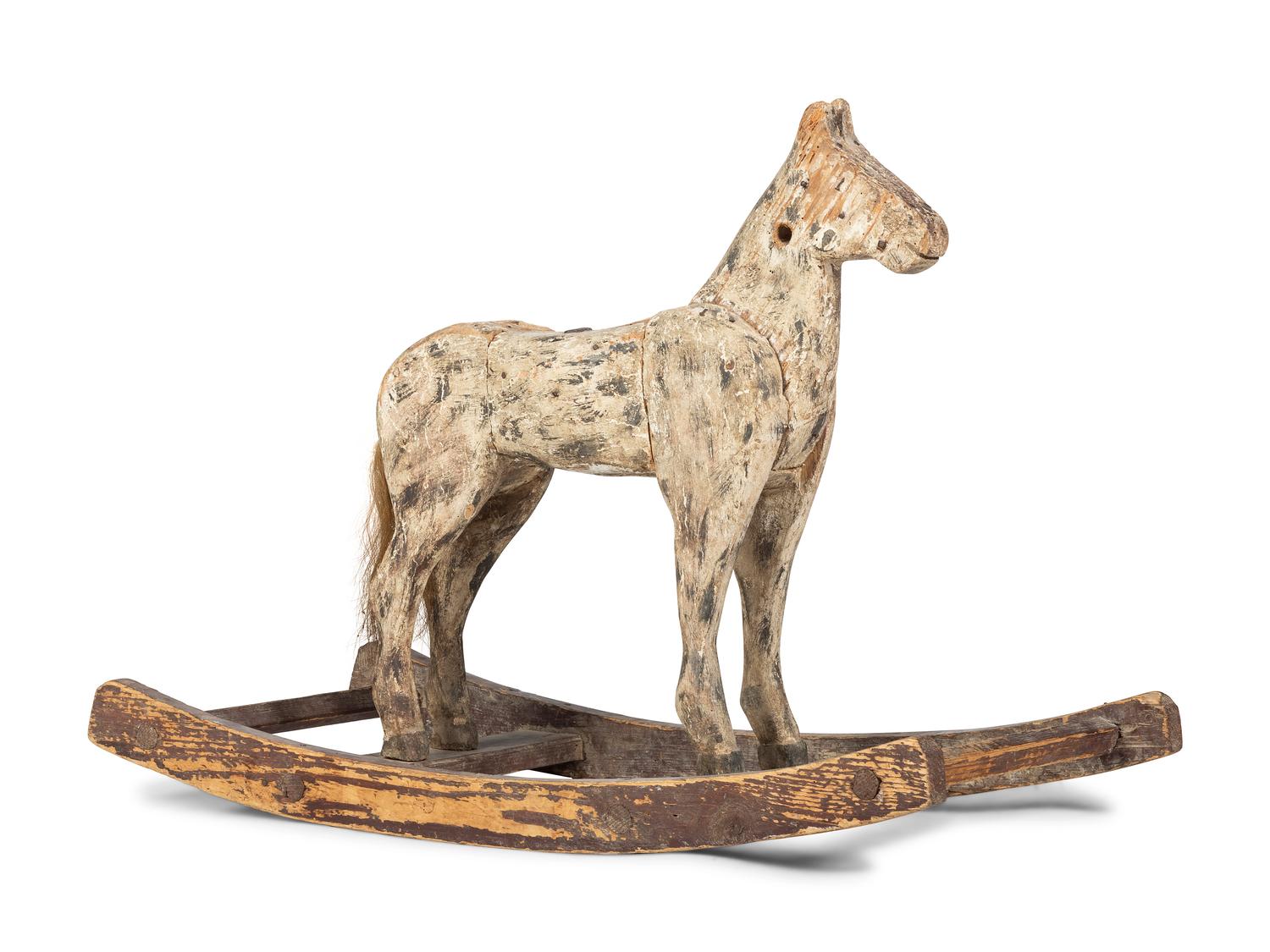 A Folk Art Painted Rocking Horse