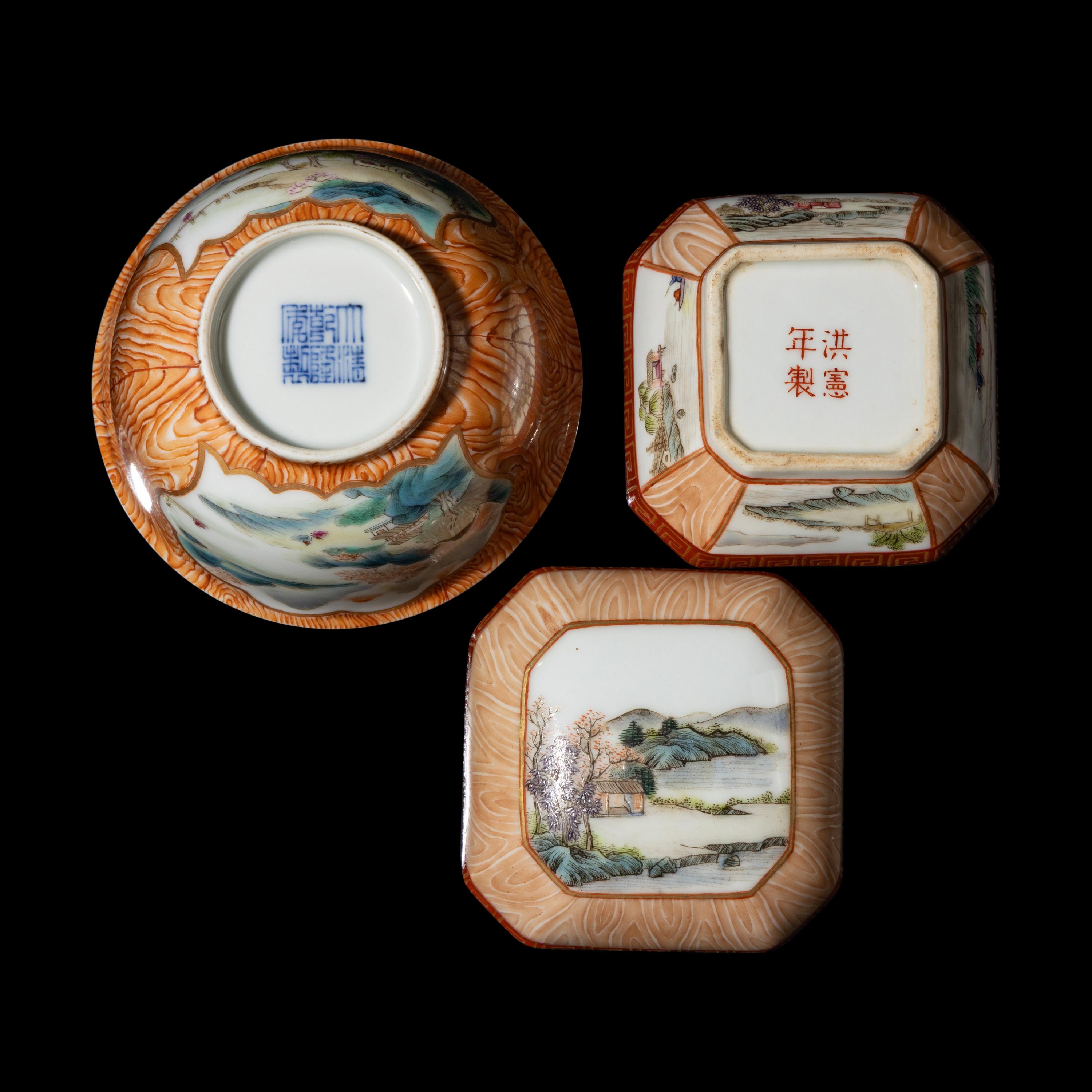 Two Chinese Faux-Bois and Famille Rose Porcelain Wares, Late 19th-Early 20th Century — 晚清-民國 粉彩仿木紋開光山水圖八方小蓋盒及茶杯