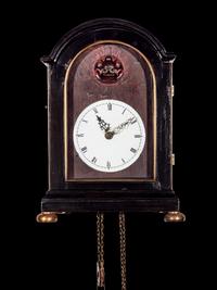 A Japanese Ebonized Cased Lantern Clock with Gourd-Form Weight