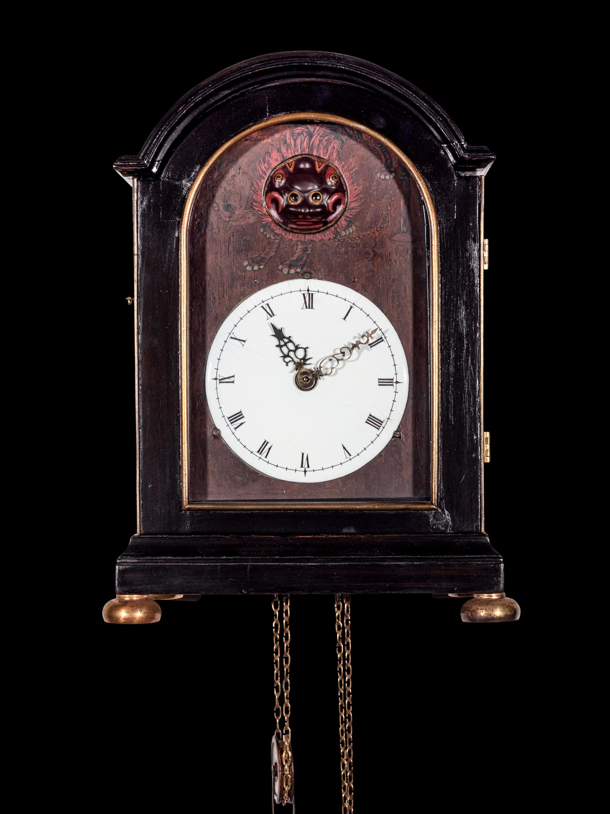 A Japanese Ebonized Cased Lantern Clock with Gourd-Form Weight