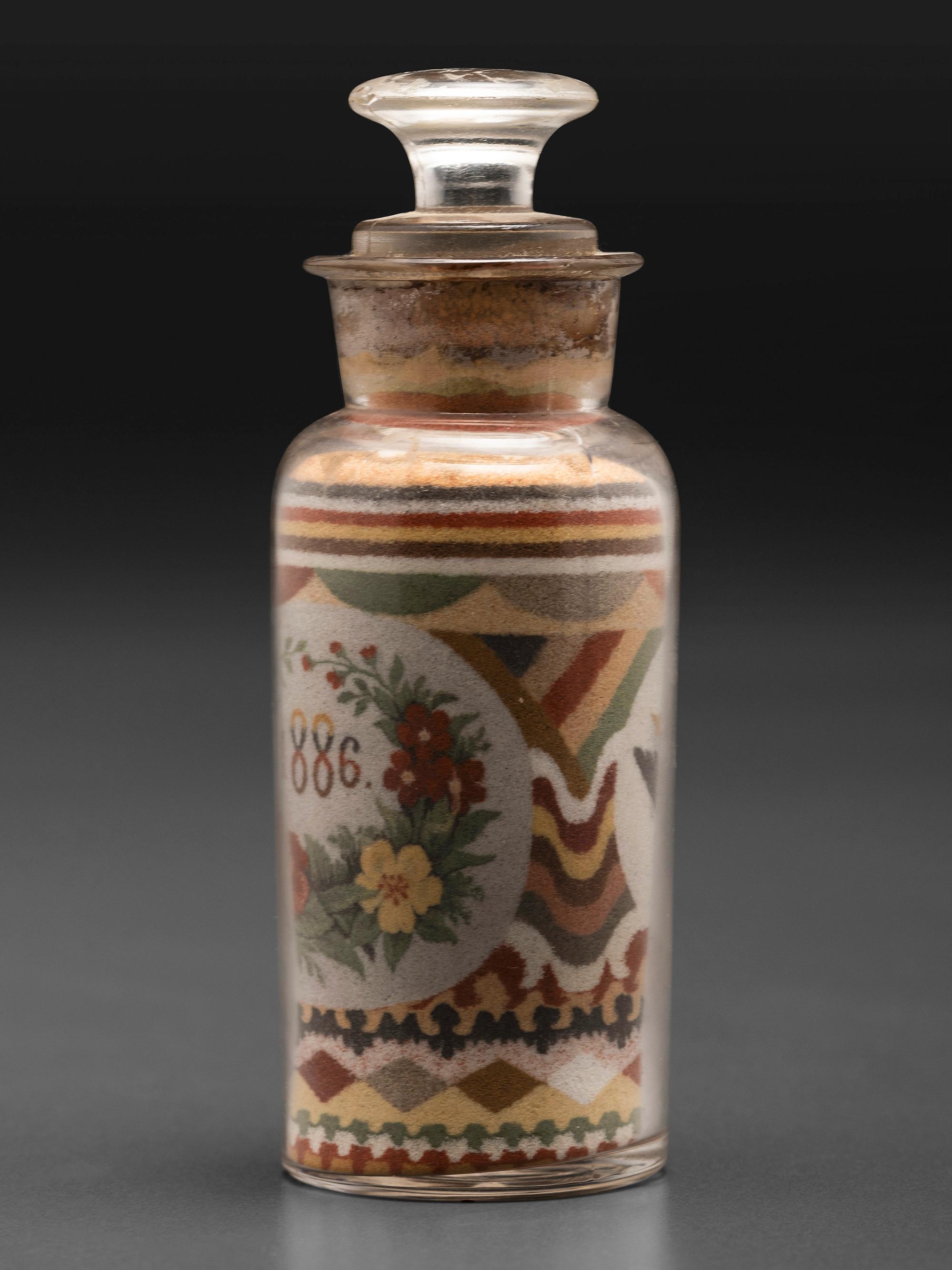 An Andrew Clemens (American, 1857-1894) Eagle Sand Bottle