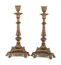 A Pair of Neoclassical Gilt Bronze and Brass Candlesticks