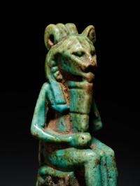 An Egyptian Faience Isis and Horus and an Egyptian Faience Sekhmet