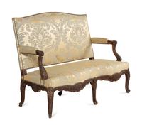 A Louis XV Style Carved Walnut and Silk Damask Upholstered Settee