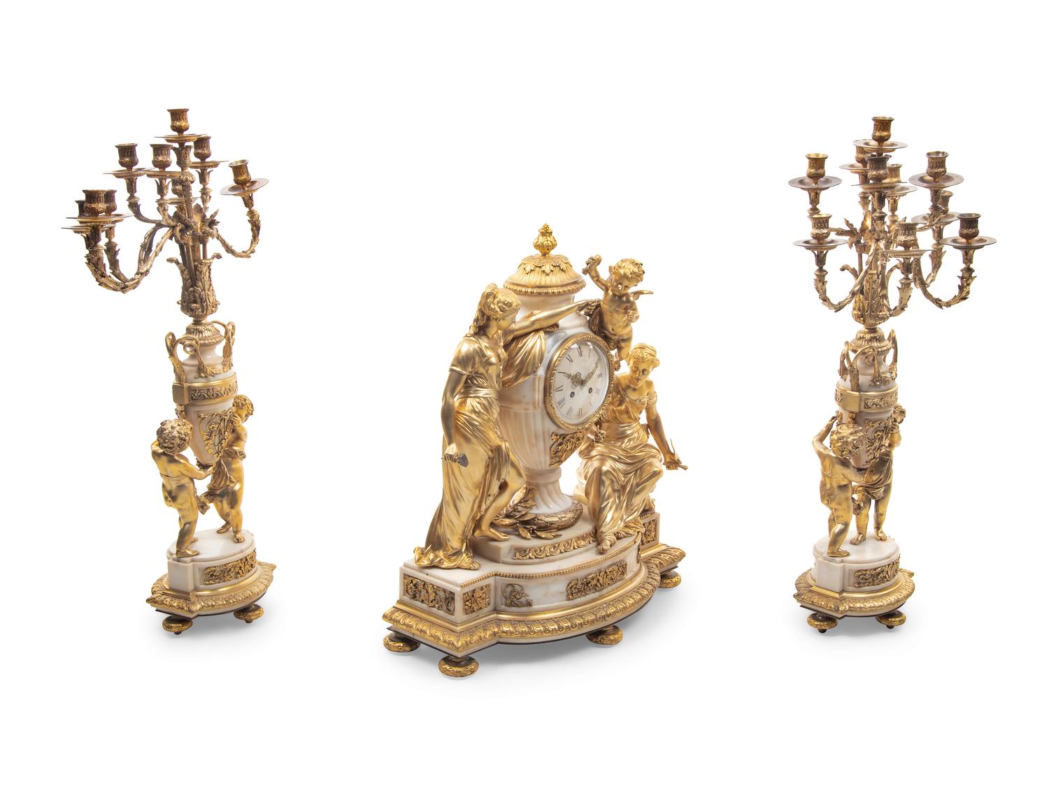 A Large and Impressive Louis XVI Style Gilt Bronze and Marble Clock Garniture