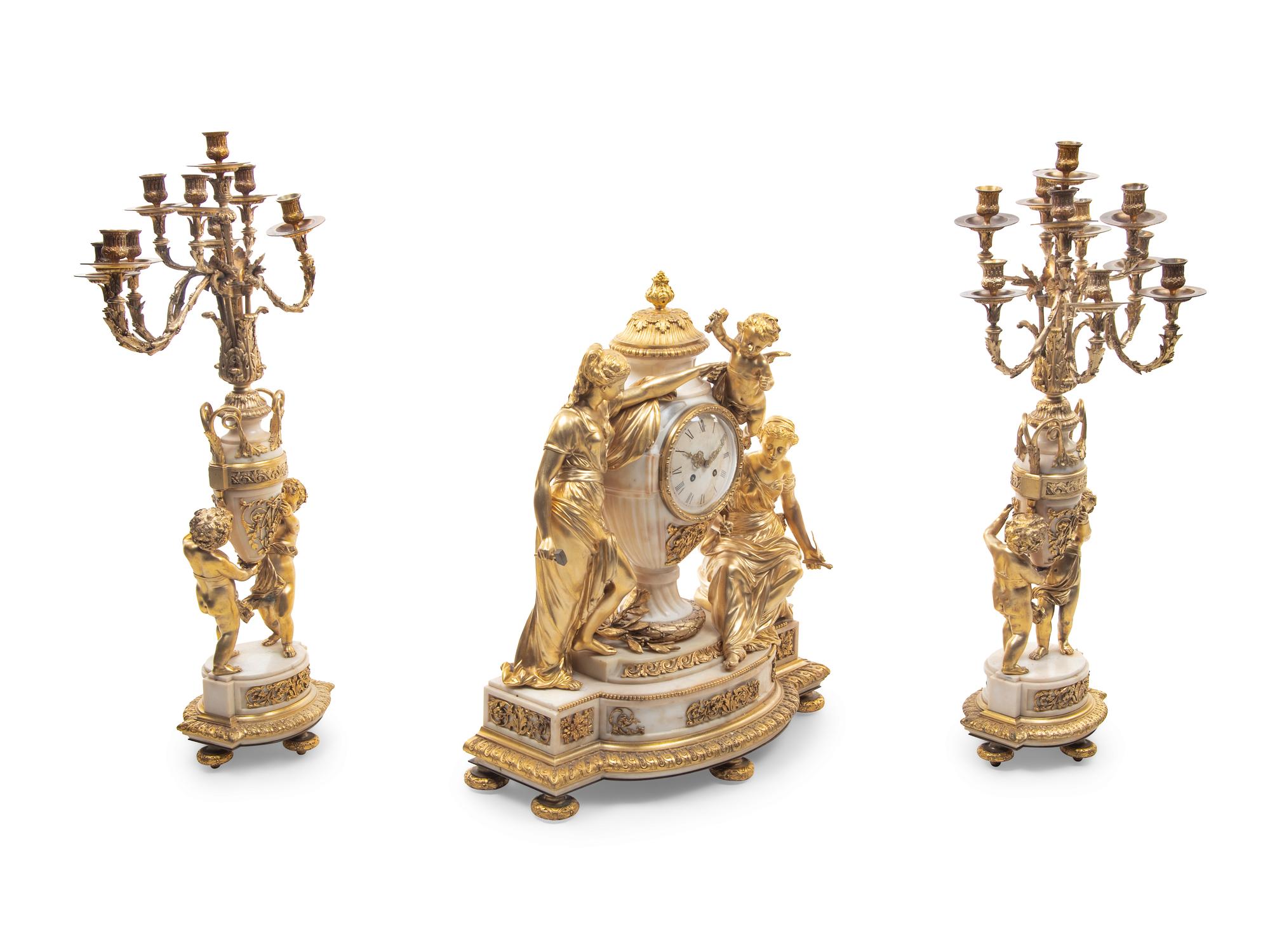 A Large and Impressive Louis XVI Style Gilt Bronze and Marble Clock Garniture