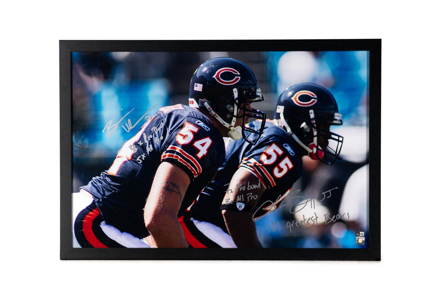 A Brian Urlacher and Lance Briggs 100 Greatest Bears Signed and Multi-Inscribed Poster Print (Beckett Authentication Services Letter of Authenticity)