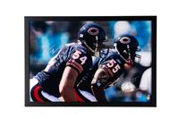 A Brian Urlacher and Lance Briggs 100 Greatest Bears Signed and Multi-Inscribed Poster Print (Beckett Authentication Services Letter of Authenticity)