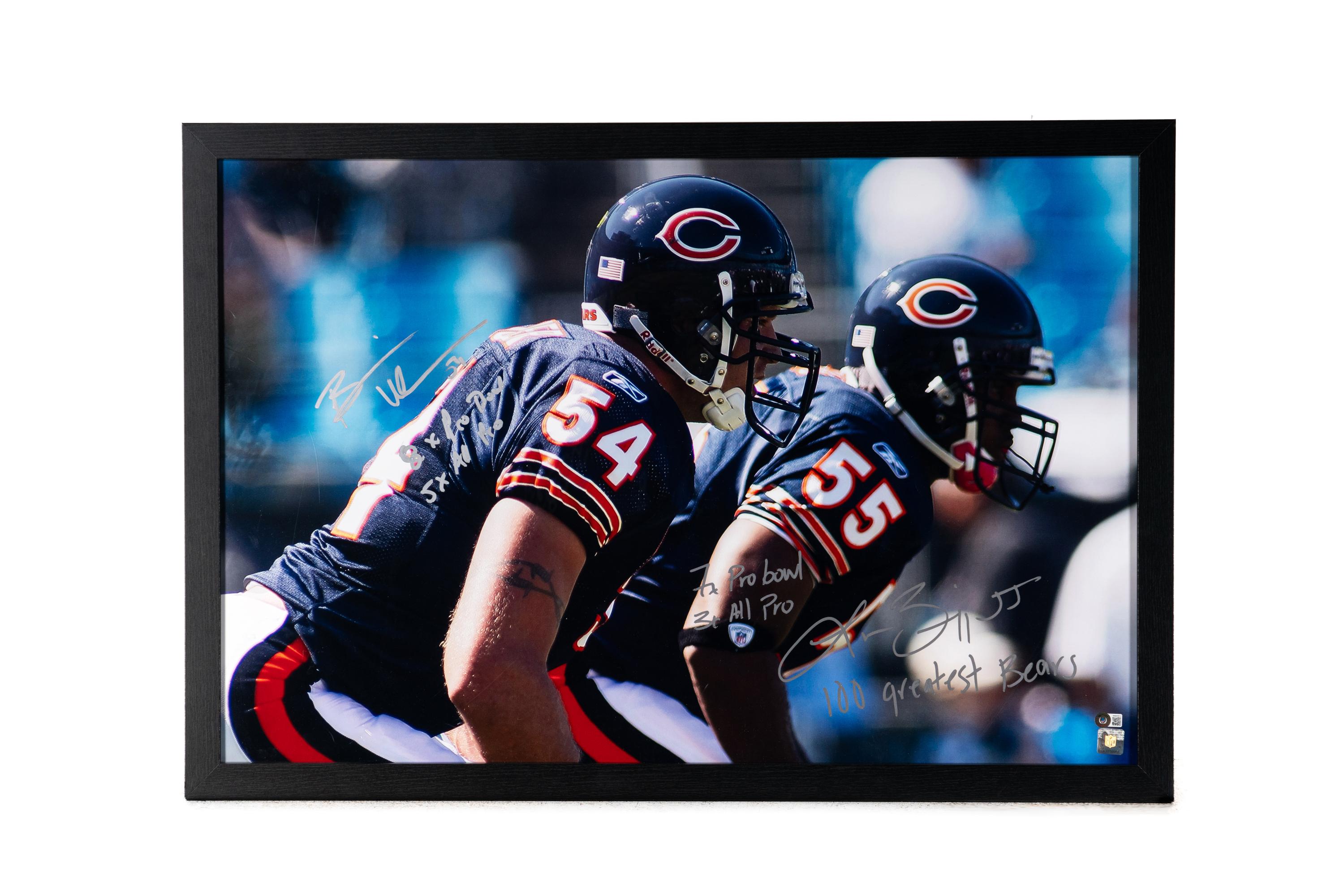 A Brian Urlacher and Lance Briggs 100 Greatest Bears Signed and Multi-Inscribed Poster Print (Beckett Authentication Services Letter of Authenticity)