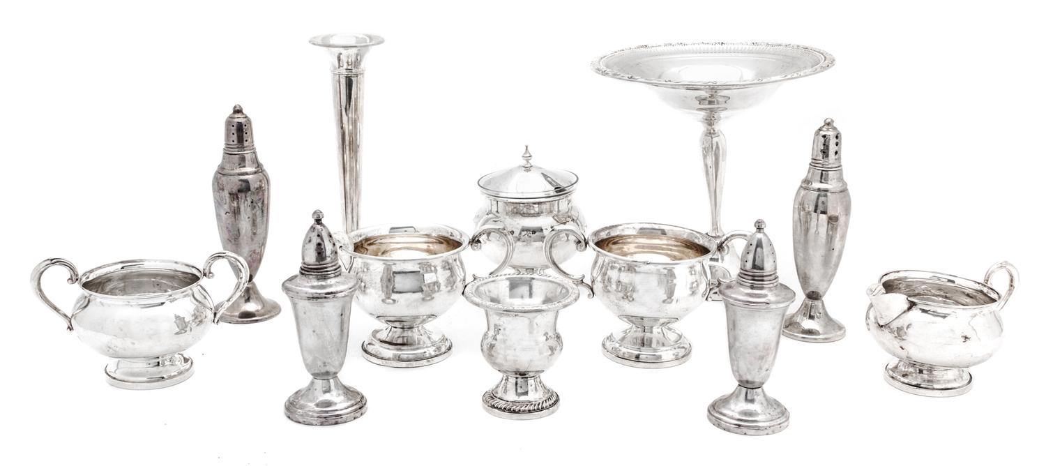 A Collection of Weighted Silver Articles, Various Makers, comprising 1 footed tazza, 1 bud vase, 1 cigarette urn, 2 pairs of salt and p