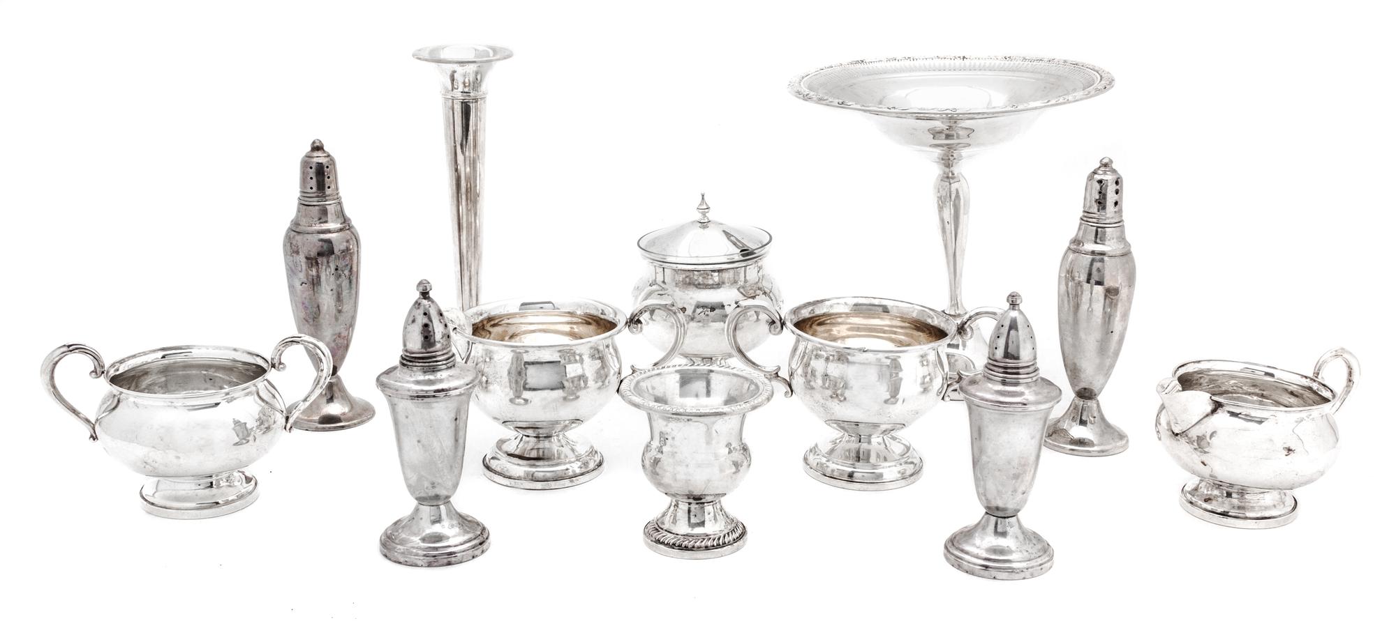 A Collection of Weighted Silver Articles, Various Makers, comprising 1 footed tazza, 1 bud vase, 1 cigarette urn, 2 pairs of salt and p
