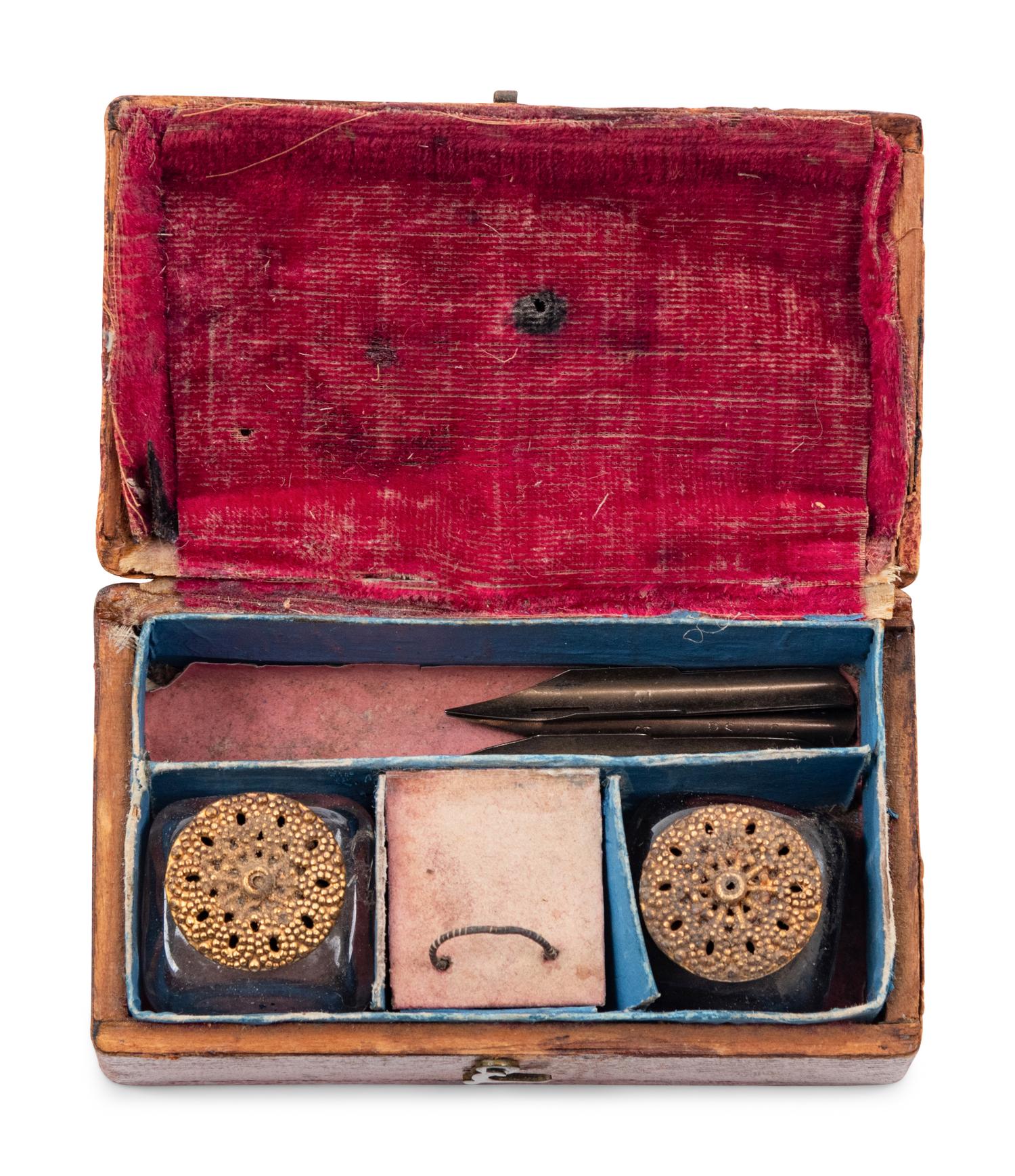 A Group of English Inkwells and Miniature Stationery Cases