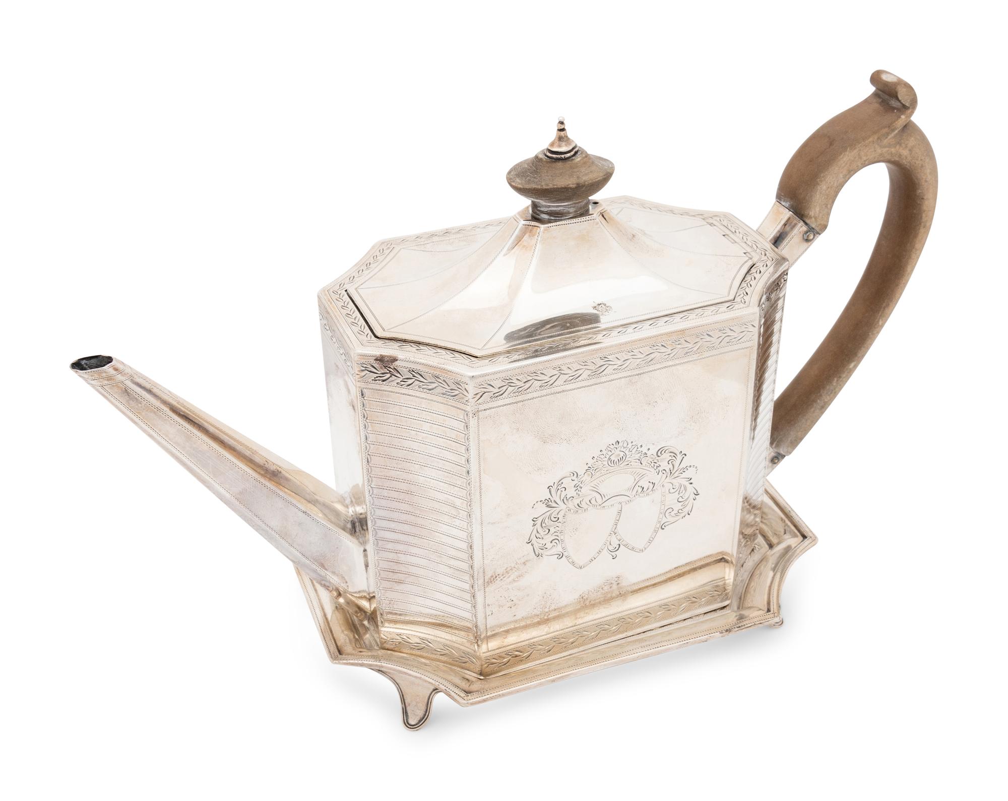 An English George III Silver Teapot and Stand