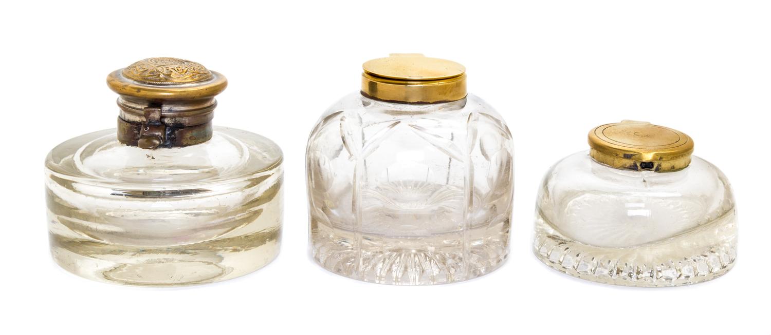 Three Brass Mounted Glass Inkwells Height of tallest 2 7/8 inches.