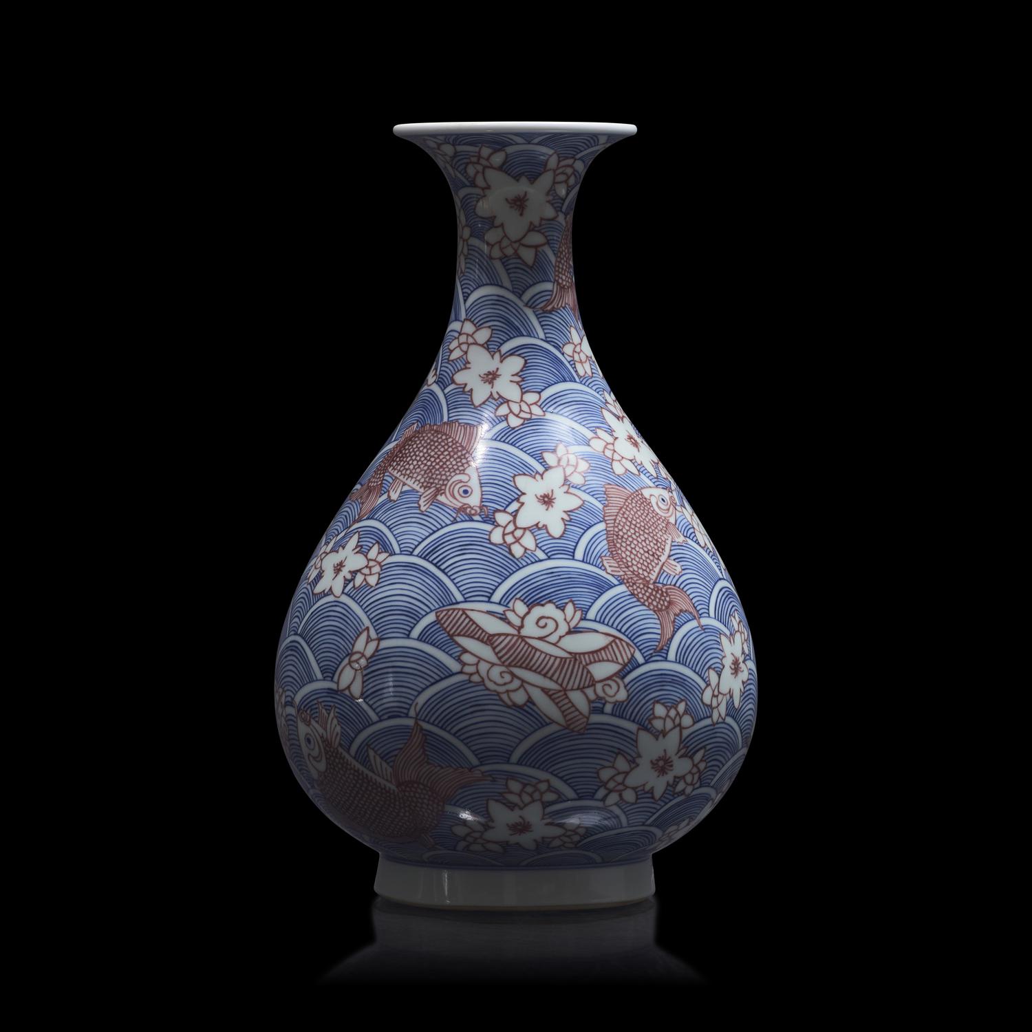 A Chinese Underglazed Blue and Red Porcelain Vase, Yuhuchunping 青花釉裡紅海水魚紋玉壺春瓶