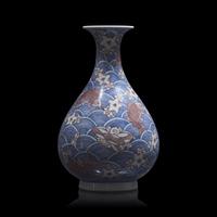 A Chinese Underglazed Blue and Red Porcelain Vase, Yuhuchunping 青花釉裡紅海水魚紋玉壺春瓶