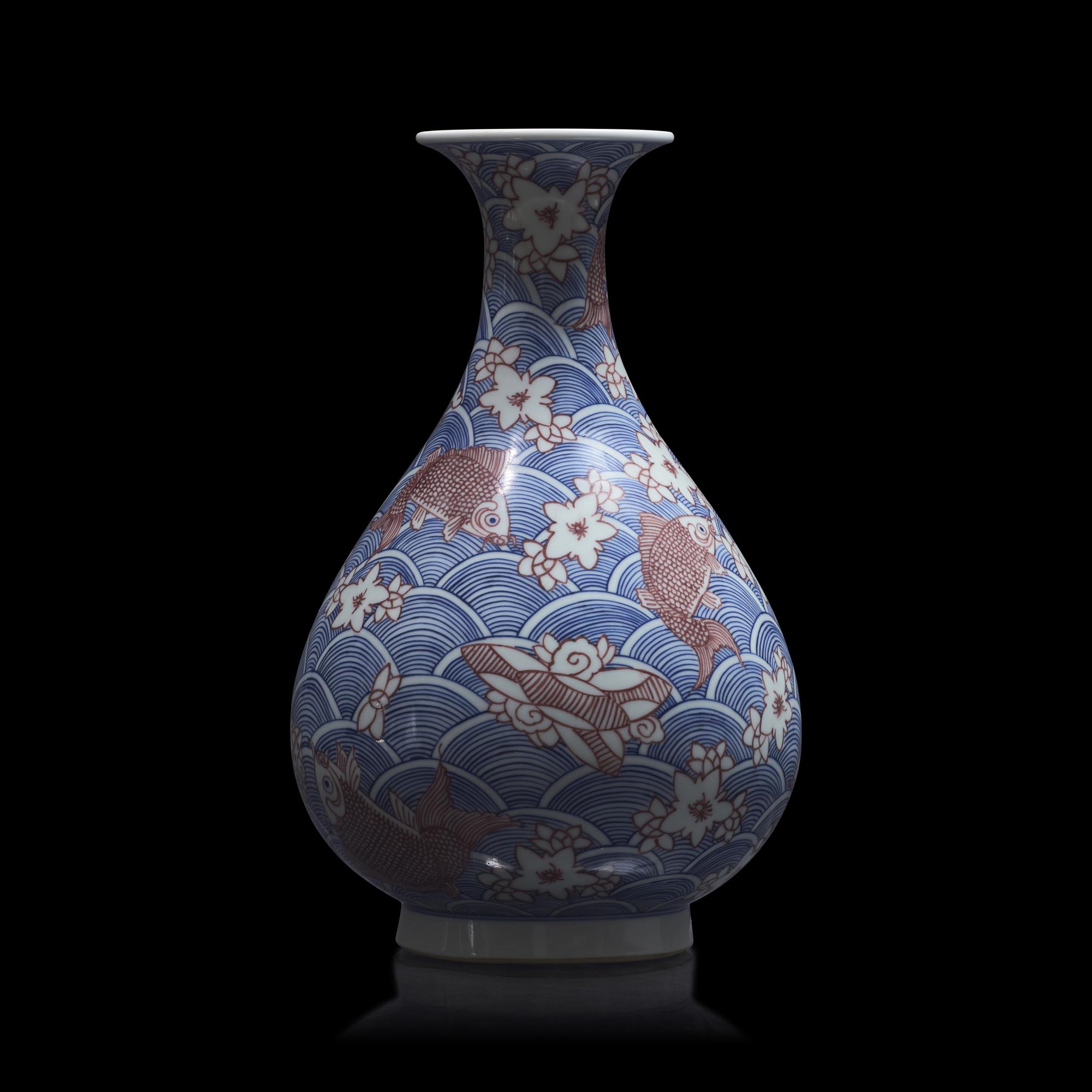 A Chinese Underglazed Blue and Red Porcelain Vase, Yuhuchunping 青花釉裡紅海水魚紋玉壺春瓶