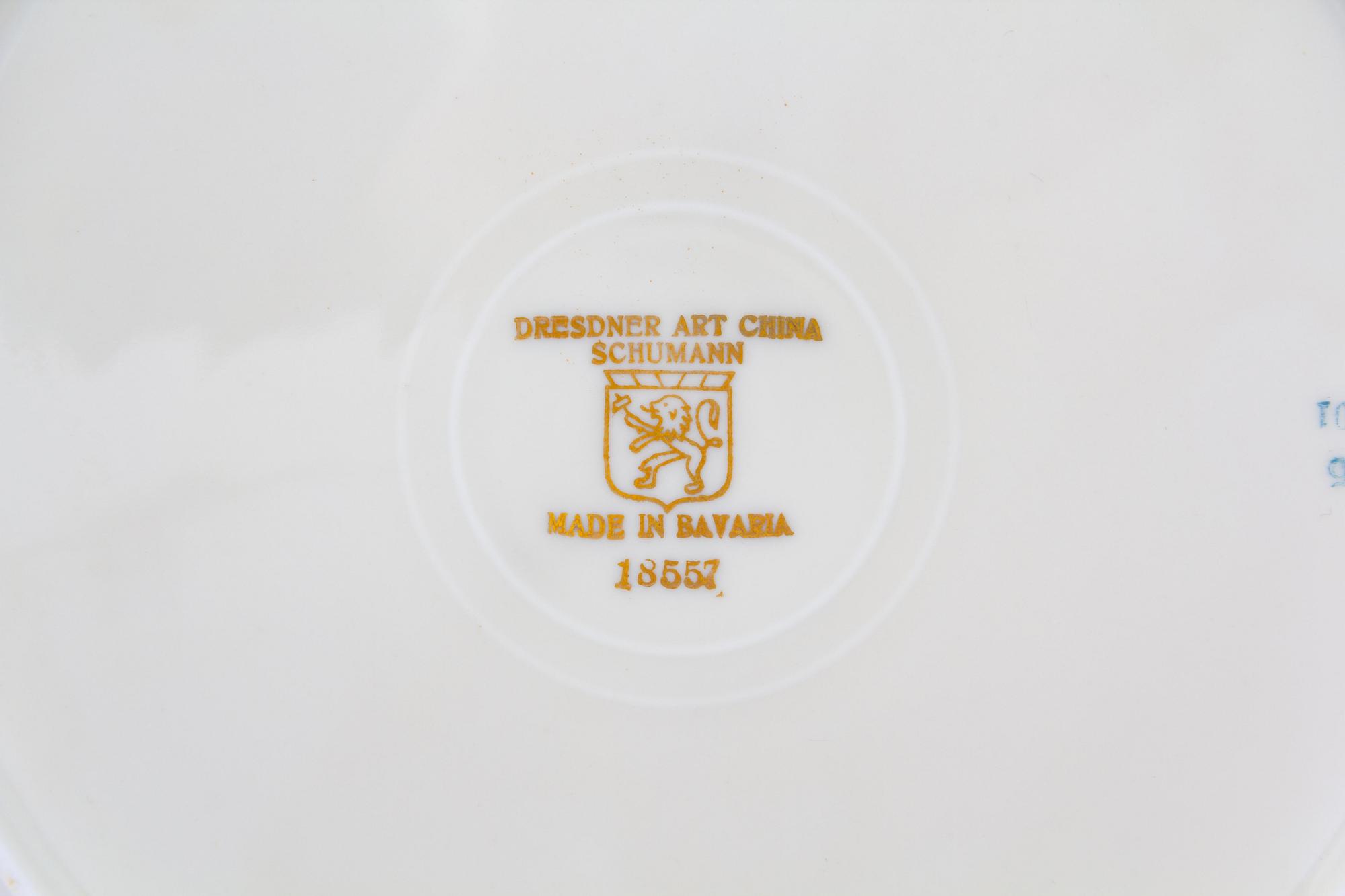 A Set of Twelve Bavarian Porcelain Dinner Plates