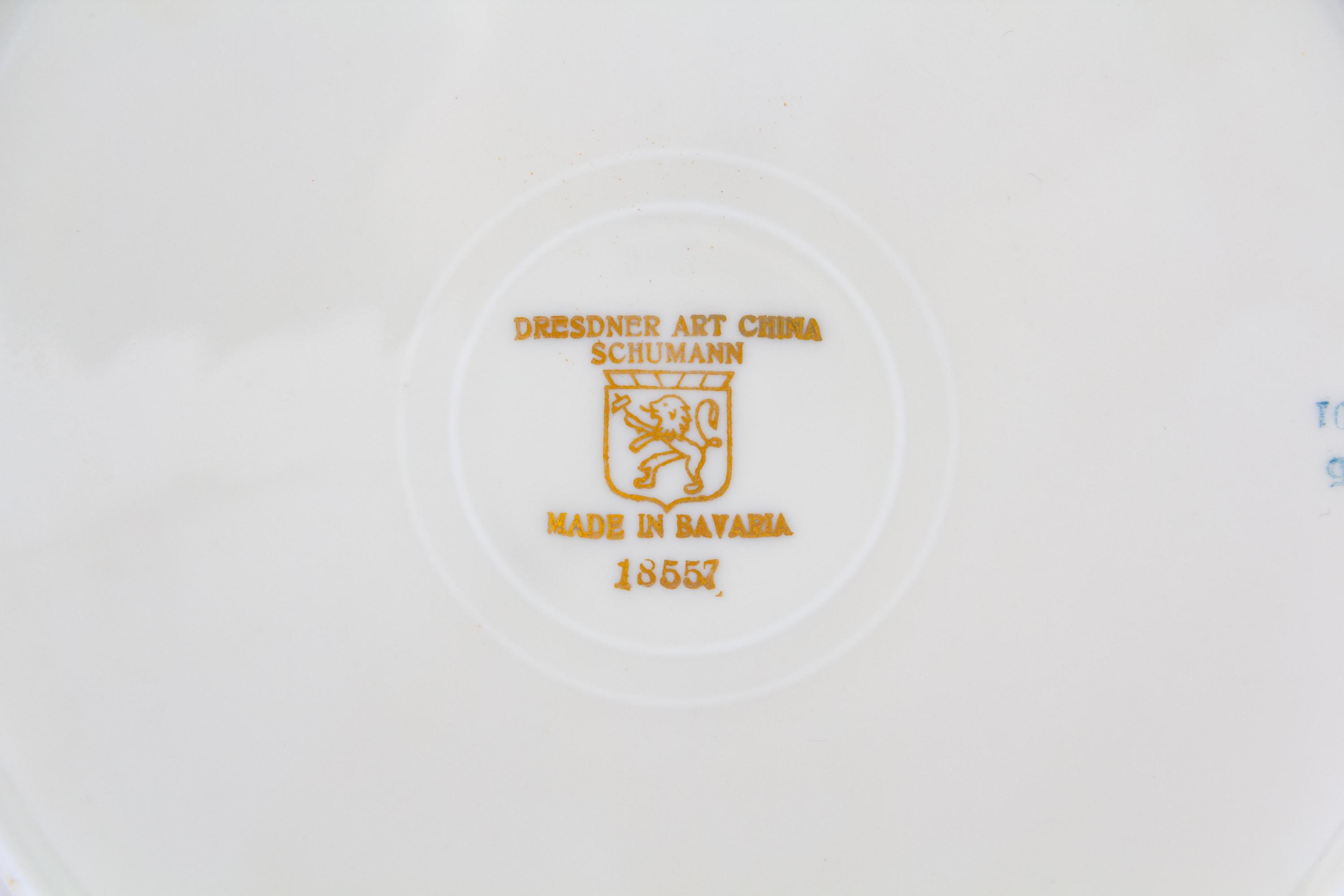 A Set of Twelve Bavarian Porcelain Dinner Plates