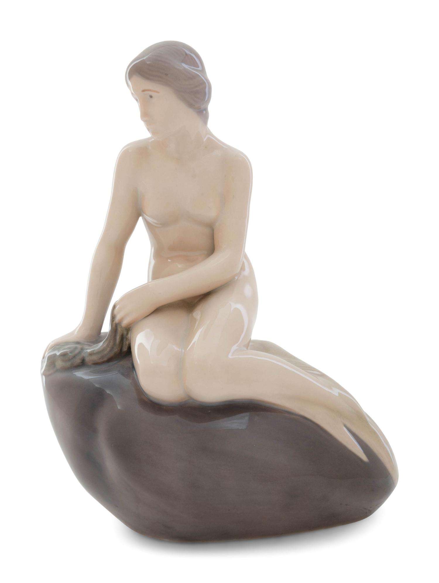 A Royal Copenhagen Porcelain Figure of a Mermaid