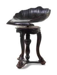 A Continental Ebonized Harp Stool