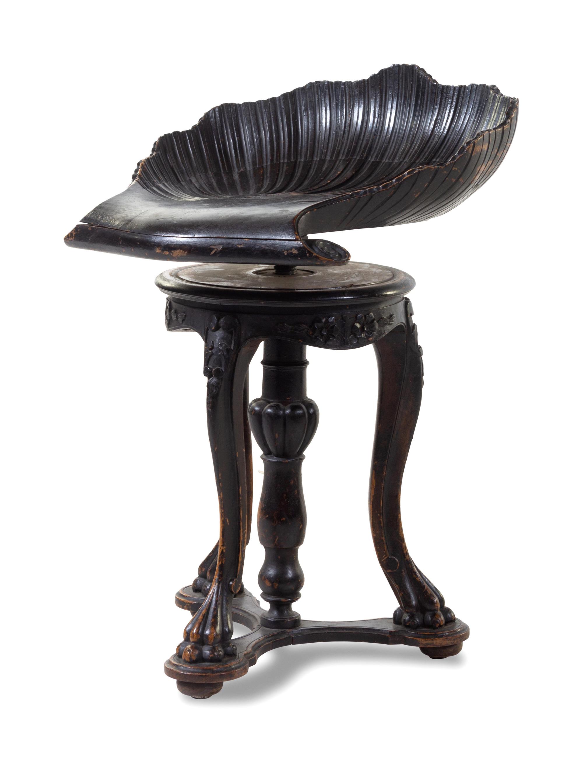 A Continental Ebonized Harp Stool