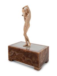 A Continental Onyx and Gilt Metal Figural Lamp