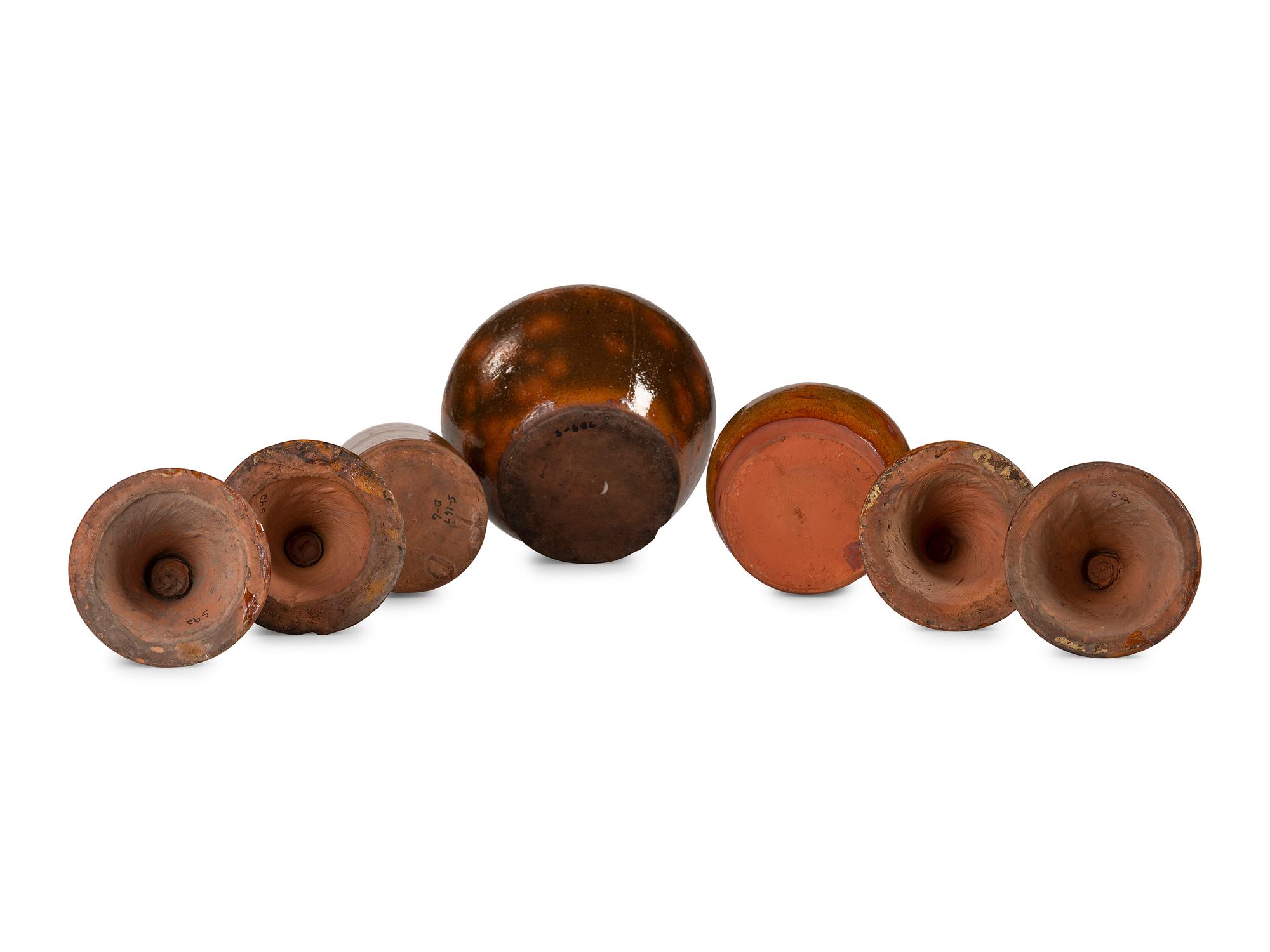 Seven Galena Glaze Redware Articles