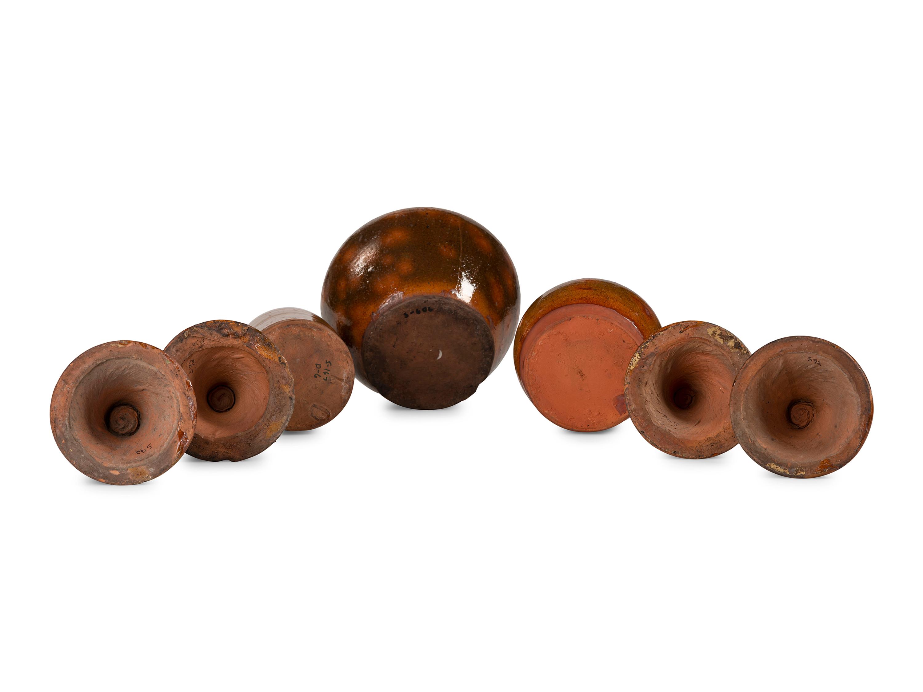 Seven Galena Glaze Redware Articles