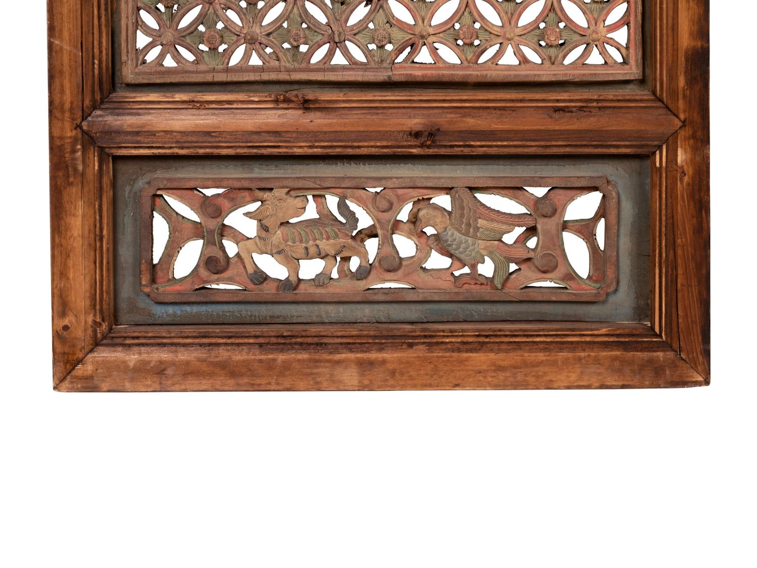 A Group of Four Chinese Pierce-Carved and Polychrome Decorated Window Panels