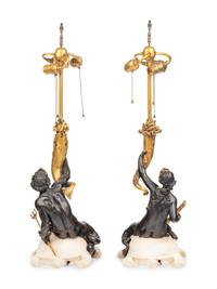 A Pair of American Gilt and Patinated Bronze and Carved Marble Figural Table Lamps
