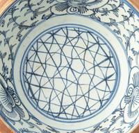 A Set of Eight Chinese Export Brown Glazed and Blue and White Bowls