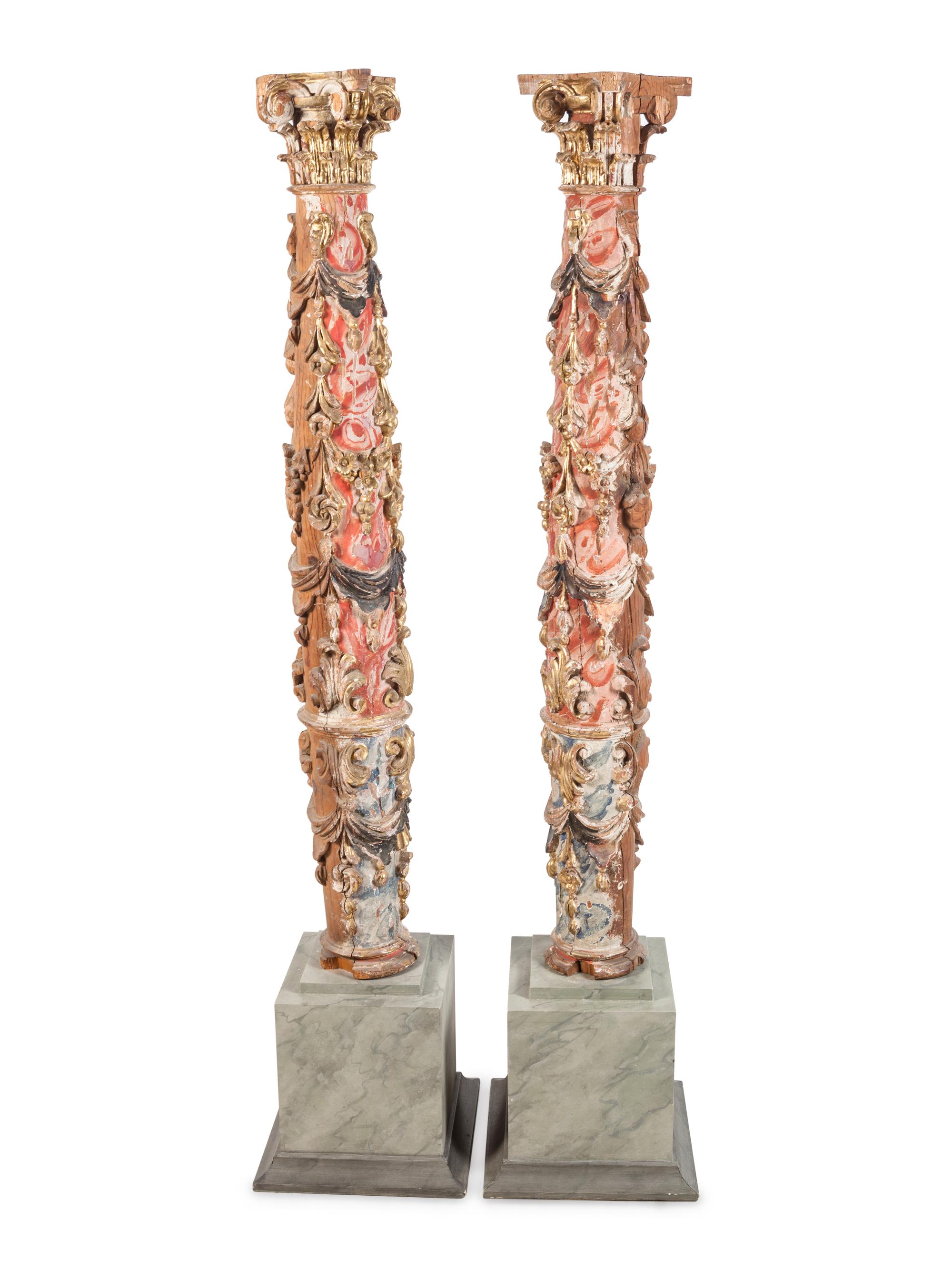 A Pair of Spanish Painted and Parcel Gilt Solomonic Columns